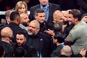 15 November 2024; Promoter Eddie Hearn, right, exchanges words with Jordan Maldonado, manager of Amanda Serrano and MVP promotions co-founder Nakisa Bidarian after the undisputed super lightweight championship fight between Katie Taylor and Amanda Serrano at AT&T Stadium in Arlington, Texas, USA. Photo by Stephen McCarthy/Sportsfile
