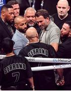 15 November 2024; Promoter Eddie Hearn, right, exchanges words with Jordan Maldonado, manager of Amanda Serrano and MVP promotions co-founder Nakisa Bidarian, left, after the undisputed super lightweight championship fight between Katie Taylor and Amanda Serrano at AT&T Stadium in Arlington, Texas, USA. Photo by Stephen McCarthy/Sportsfile