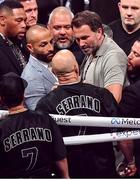 15 November 2024; Promoter Eddie Hearn, right, exchanges words with Jordan Maldonado, manager of Amanda Serrano and MVP promotions co-founder Nakisa Bidarian, left, after the undisputed super lightweight championship fight between Katie Taylor and Amanda Serrano at AT&T Stadium in Arlington, Texas, USA. Photo by Stephen McCarthy/Sportsfile