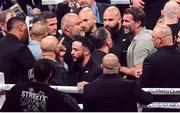 15 November 2024; Promoter Eddie Hearn, right, exchanges words with Jordan Maldonado, manager of Amanda Serrano, left, after the undisputed super lightweight championship fight between Katie Taylor and Amanda Serrano at AT&T Stadium in Arlington, Texas, USA. Photo by Stephen McCarthy/Sportsfile