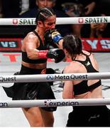 15 November 2024; Amanda Serrano, left, and Katie Taylor during their undisputed super lightweight championship fight at AT&T Stadium in Arlington, Texas, USA. Photo by Stephen McCarthy/Sportsfile