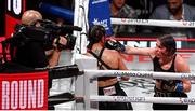 15 November 2024; Katie Taylor, right, and Amanda Serrano during their undisputed super lightweight championship fight at AT&T Stadium in Arlington, Texas, USA. Photo by Stephen McCarthy/Sportsfile