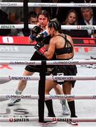15 November 2024; Katie Taylor, left, and Amanda Serrano during their undisputed super lightweight championship fight at AT&T Stadium in Arlington, Texas, USA. Photo by Stephen McCarthy/Sportsfile