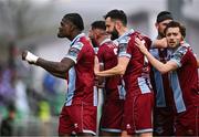 16 November 2024; Frantz Pierrot of Drogheda United, left, celebrates with teammates, from left, Dave Webster, Ryan Brennan and Darragh Markey after scoring their second goal during the SSE Airtricity Men's Premier Division Promotion / Relegation Play-Off match between Bray Wanderers and Drogheda United at Tallaght Stadium in Dublin. Photo by Ben McShane/Sportsfile