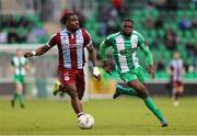 16 November 2024; Frantz Pierrot of Drogheda United in action against Cole Omorehiomwan of Bray Wanderers during the SSE Airtricity Men's Premier Division Promotion / Relegation Play-Off match between Bray Wanderers and Drogheda United at Tallaght Stadium in Dublin. Photo by Thomas Flinkow/Sportsfile