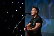 16 November 2024; Singer Mickey Joe Harte performs during the TG4 Ladies Football All Stars Awards banquet, in association with Lidl, at the Bonnington Dublin Hotel in Dublin. Photo by Brendan Moran/Sportsfile