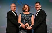 16 November 2024; Former Laois footballer Sue Ramsbottom is presented with the Hall of Fame award by Ard Stiúrthóir TG4 Alan Esslemont, left, and President of the LGFA, Mícheál Naughton during the TG4 Ladies Football All Stars Awards banquet, in association with Lidl, at the Bonnington Dublin Hotel in Dublin. Photo by Brendan Moran/Sportsfile