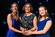 16 November 2024; Former Laois footballer Sue Ramsbottom with her Hall of Fame award, and daughters Caoimhe, left, and Emma during the TG4 Ladies Football All Stars Awards banquet, in association with Lidl, at the Bonnington Dublin Hotel in Dublin. Photo by Brendan Moran/Sportsfile