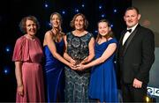 16 November 2024; Former Laois footballer Sue Ramsbottom with her Hall of Fame award, and, from left, mother Kathleen, daughters Caoimhe and Emma and brother James during the TG4 Ladies Football All Stars Awards banquet, in association with Lidl, at the Bonnington Dublin Hotel in Dublin. Photo by Brendan Moran/Sportsfile