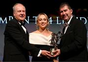 16 November 2024; Aoife McCoy of Armagh is presented with her All-Star award by Ard Stiúrthóir TG4 Alan Esslemont and President of the LGFA, Mícheál Naughton during the TG4 Ladies Football All Stars Awards banquet, in association with Lidl, at the Bonnington Dublin Hotel in Dublin.  Photo by Brendan Moran/Sportsfile
