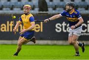 17 November 2024; AJ Murphy of Na Fianna in action against Darren Maher of Clogh-Ballacolla during the AIB Leinster GAA Senior Club Hurling Championship quarter-final match between Na Fianna and Clogh Ballacolla at Parnell Park in Dublin. Photo by Stephen Marken/Sportsfile