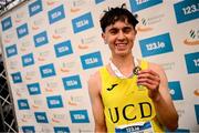 17 November 2024; Jonas Stafford of UCD, Dublin, celebrates winning the Boy's U18 race during the 123.ie National Senior, Junior and Juvenile Even Age Cross Country Championships at Castle Irvine Estate in Irvinestown, Fermanagh. Photo by Ramsey Cardy/Sportsfile