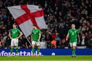 17 November 2024; Republic of Ireland players, from left, Mark McGuinness, Jayson Molumby and Josh Cullen react after their side concede their first goal during the UEFA Nations League B Group 2 match between England and Republic of Ireland at Wembley Stadium in London, England. Photo by Stephen McCarthy/Sportsfile