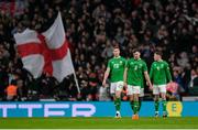 17 November 2024; Republic of Ireland players, from left, Mark McGuinness, Jayson Molumby and Dara O'Shea react after their side concede their second goal during the UEFA Nations League B Group 2 match between England and Republic of Ireland at Wembley Stadium in London, England. Photo by Stephen McCarthy/Sportsfile