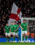 17 November 2024; Republic of Ireland players, from left, Josh Cullen, Mark McGuinness, Finn Azaz and Nathan Collins react after his side concede their fourth goal during the UEFA Nations League B Group 2 match between England and Republic of Ireland at Wembley Stadium in London, England. Photo by Harry Murphy/Sportsfile