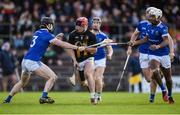 17 November 2024; Peter Clarke of Castletown Geoghegan is tackled by Jay Burke, left, and Zach Bay Hammond of Thomastown during the AIB Leinster GAA Senior Club Hurling Championship quarter-final match between Castletown Geoghegan and Thomastown at TEG Cusack Park in Mullingar, Westmeath. Photo by Tom Beary/Sportsfile