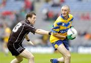 22 August 2004; Denis Russell, Clare, is tackled by Noel McGuire, Sligo. Tommy Murphy Cup Final, Clare v Sligo, Croke Park, Dublin. Picture credit; Matt Browne / SPORTSFILE
