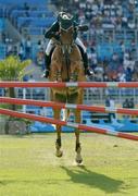 27 August 2004; Ireland's Kevin Babbington on Carling King in action during the 1st round of the Individual Jumping Competition in which he finished with 8 faults. Markopoulo Olympic Equestrian Centre. Games of the XXVIII Olympiad, Athens Summer Olympics Games 2004, Athens, Greece. Picture credit; Brendan Moran / SPORTSFILE