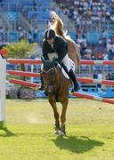 27 August 2004; Ireland's Kevin Babbington on Carling King in action during the 1st round of the Individual Jumping Competition in which he finished with 8 faults. Markopoulo Olympic Equestrian Centre. Games of the XXVIII Olympiad, Athens Summer Olympics Games 2004, Athens, Greece. Picture credit; Brendan Moran / SPORTSFILE