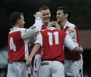 27 August 2004; Aiden O'Keefe, 11, St. Patrick's Athletic, celebrates with team-mates Mark Quinless (4), Darragh Maguire, right, and Colm Foley, after scoring a goal for his side. eircom league, Premier Division, St. Patrick's Athletic v Waterford United, Richmond Park, Dublin. Picture credit; Brian Lawless / SPORTSFILE