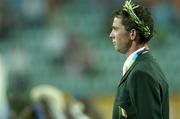 27 August 2004; Ireland's Cian O'Connor stands for the National Anthem after receiving his Gold Medal for winning the Individual Jumping Competition on Waterford Crystal. Markopoulo Olympic Equestrian Centre. Games of the XXVIII Olympiad, Athens Summer Olympics Games 2004, Athens, Greece. Picture credit; Brendan Moran / SPORTSFILE