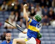 28 August 2004; Tony Scroope, Tipperary, in action against Aaron Dynes, Down. Erin All-Ireland U21 Hurling Championship Semi-Final, Tipperary v Down, O'Moore Park, Portlaoise, Co. Laois.  Picture credit; Matt Browne / SPORTSFILE