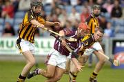 28 August 2004; Kenneth Burke, Galway, in action against Tommy Walsh, right, and Michael Fennelly, Kilkenny. Erin All-Ireland U21 Hurling Championship Semi-Final, Galway v Kilkenny, O'Moore Park, Portlaoise, Co. Laois.  Picture credit; Matt Browne / SPORTSFILE