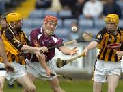 28 August 2004; David Hayes, Galway, in action against James 'Cha' Fitzpatrick, left, and Eoin Reid, Kilkenny. Erin All-Ireland U21 Hurling Championship Semi-Final, Galway v Kilkenny, O'Moore Park, Portlaoise, Co. Laois.  Picture credit; Matt Browne / SPORTSFILE