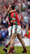 28 August 2004; Mayo players David Brady, 9, and Dermot Geraghty celebrate at the final whistle. Bank of Ireland Senior Football Championship Semi-Final Replay, Mayo v Fermanagh, Croke Park, Dublin.  Picture credit; Ray McManus / SPORTSFILE