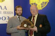 28 August 2004; GAA President Sean Kelly presents the GAA MacNamee Award 2003 for the 'Best County GAA Yearbook' to Fintan Mussen. Burlington Hotel, Dublin  Picture credit; Ray McManus / SPORTSFILE