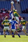 29 August 2004; Brian Moran, Kerry, in action against Enda Butler, Laois. All-Ireland Minor Football Championship Semi-Final, Kerry v Laois, Croke Park, Dublin. Picture credit; Ray McManus / SPORTSFILE