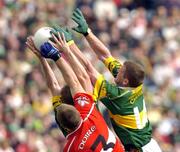 29 August 2004; Mike Frank Russell and Dara O'Cinneide,14, Kerry, in action against Niall McCuskey, Derry. Bank of Ireland Senior Football Championship Semi-Final, Derry v Kerry, Croke Park, Dublin. Picture credit; Matt Browne / SPORTSFILE