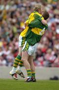 29 August 2004; Kerry players Killian Young , 4, and Brendan Kealy celebrate victory. All-Ireland Minor Football Championship Semi-Final, Kerry v Laois, Croke Park, Dublin. Picture credit; Ray McManus / SPORTSFILE