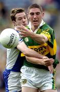 29 August 2004; Killian Young, Kerry, clears under pressure from Joe Delaney, Laois. All-Ireland Minor Football Championship Semi-Final, Kerry v Laois, Croke Park, Dublin. Picture credit; Ray McManus / SPORTSFILE