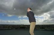 30 August 2004; Hurler DJ Carey after teeing off from the roof of the Gravity Bar in the Guinness Storehouse to announce details of Budweiser's sponsorship of the 2006 Ryder Cup - Budweiser is 'Official Sponsor' of the 2006 Ryder Cup matches. Guinness Storehouse, Dublin. Picture credit; Pat Murphy / SPORTSFILE