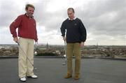 30 August 2004; Hurler DJ Carey and Ireland's up and coming professional golfer Colm Moriarty, left, in jovial mood before teeing off from the roof of the Gravity Bar in the Guinness Storehouse to announce details of Budweiser's sponsorship of the 2006 Ryder Cup - Budweiser is 'Official Sponsor' of the 2006 Ryder Cup matches. Guinness Storehouse, Dublin. Picture credit; Pat Murphy / SPORTSFILE