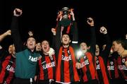 30 August 2004; Barry Ferguson, Longford Town captain, lifts the  eircom League cup with team-mates after victory over Bohemians. eircom League Cup final, Longford Town v Bohemians, Flancare Park, Drogheda. Picture credit; David Maher / SPORTSFILE