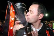 30 August 2004; Alan Mathews, Longford Town manager celebrates with the eircom league cup at the end of the game after victory over Bohemians. eircom League Cup final, Longford Town v Bohemians, Flancare Park, Drogheda. Picture credit; David Maher / SPORTSFILE