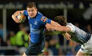 27 September 2013; Brian O'Driscoll, Leinster, is tackled by Lloyd Williams, Cardiff Blues. Celtic League 2013/14, Round 4, Leinster v Cardiff Blues, RDS, Ballsbridge, Dublin. Picture credit: Brendan Moran / SPORTSFILE