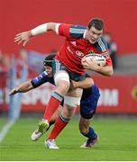 28 September 2013; Peter O'Mahony, Munster, is tackled by Kristopher Burton, Newport Gwent Dragons. Celtic League 2013/14, Round 4, Munster v Newport Gwent Dragons, Musgrave Park, Cork. Picture credit: Diarmuid Greene / SPORTSFILE