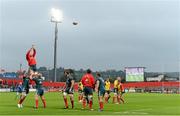 28 September 2013; Munster players warm up before the game as the final minutes of the GAA Hurling All-Ireland Final are played on a giant screen behind them. Celtic League 2013/14, Round 4, Munster v Newport Gwent Dragons, Musgrave Park, Cork. Picture credit: Diarmuid Greene / SPORTSFILE