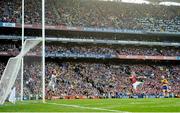 28 September 2013; Conor McGrath, Clare, beats Cork goalkeeper Anthony Nash to score his side's fourth goal. GAA Hurling All-Ireland Senior Championship Final Replay, Cork v Clare, Croke Park, Dublin. Picture credit: David Maher / SPORTSFILE