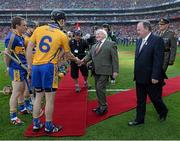 28 September 2013; Clare captain Patrick Donnellan introduces himself, and his team mates, to President of Ireland Michael D. Higgins and Uachtarán Chumann Lúthchleas Gael Liam Ó Néill before the game. GAA Hurling All-Ireland Senior Championship Final Replay, Cork v Clare, Croke Park, Dublin. Picture credit: Ray McManus / SPORTSFILE