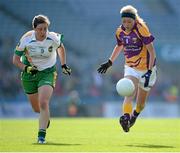 29 September 2013; Kellie Kearney, Wexford, in action against Siobhan Flannery, Offaly. TG4 All-Ireland Ladies Football Junior Championship Final, Offaly v Wexford, Croke Park, Dublin. Picture credit: Brendan Moran / SPORTSFILE
