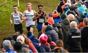 17 November 2024; Efrem Gidey of Clonliffe Harriers AC and Sean Tobin of Clonmel AC during the 123.ie National Senior, Junior and Juvenile Even Age Cross Country Championships at Castle Irvine Estate in Irvinestown, Fermanagh. Photo by Ramsey Cardy/Sportsfile