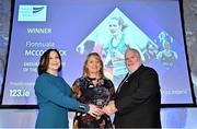 20 November 2024; Athletics Ireland Deputy President Brid Golden, centre,  receives the Endurance Athlete of the Year award on behalf of Fionnuala McCormack from Athletics Ireland President John Cronin and 123.ie Managing Director Elaine Robinson during the 123.ie National Athletics Awards ceremony at the Crowne Plaza Hotel in Santry, Dublin. A full list of winners from the event can be found at AthleticsIreland.ie Photo by Sam Barnes/Sportsfile