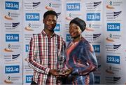 20 November 2024; Adewumi Ademola and Abdullahi Adeleke with the Sprints & Hurdles Athlete of the Year award on behalf of Rhasidat Adeleke during the 123.ie National Athletics Awards ceremony at the Crowne Plaza Hotel in Santry, Dublin. A full list of winners from the event can be found at AthleticsIreland.ie Photo by Sam Barnes/Sportsfile