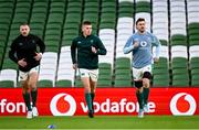 22 November 2024; Stuart McCloskey, left, Sam Prendergast, centre, and Caelan Doris during an Ireland Rugby captain's run at the Aviva Stadium in Dublin. Photo by Seb Daly/Sportsfile