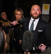22 November 2024; Mr Conor McGregor leaves court, after the court announced the jury’s decision in the civil action case, P Ní Laimhin v McGregor & Anor, in High Court 24 at Chancery Place in Dublin. Photo by David Fitzgerald/Sportsfile