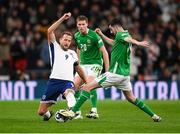 17 November 2024; Harry Kane of England in action against Mark McGuinness and Finn Azaz, right, of Republic of Ireland during the UEFA Nations League B Group 2 match between England and Republic of Ireland at Wembley Stadium in London, England. Photo by Stephen McCarthy/Sportsfile